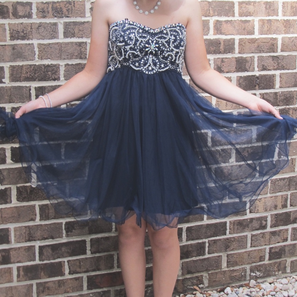 Navy blue strapless beaded dress perfect for hoco or prom! Only worn once.